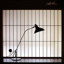 Load image into Gallery viewer, Mantis BS3 LED Desk Lamp in living room.
