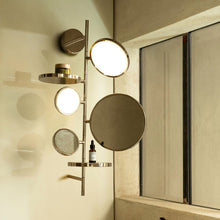 Load image into Gallery viewer, Tell Me Stories LED Wall Light in bathroom.
