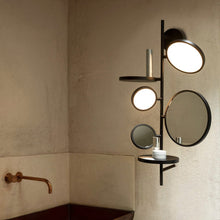 Load image into Gallery viewer, Tell Me Stories LED Wall Light in bathroom.
