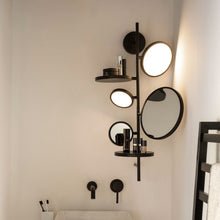 Load image into Gallery viewer, Tell Me Stories LED Wall Light in bathroom.

