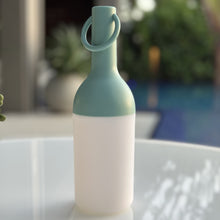 Load image into Gallery viewer, ELO Nomad Portable Outdoor LED Table Lamp in Outdoor area.
