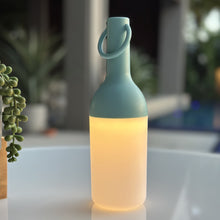 Load image into Gallery viewer, ELO Nomad Portable Outdoor LED Table Lamp in Outdoor area.
