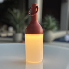 Load image into Gallery viewer, ELO Nomad Portable Outdoor LED Table Lamp in Outdoor area.

