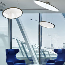Load image into Gallery viewer, Discovery LED Suspension Light in living room.
