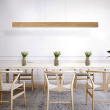 Load image into Gallery viewer, Drift Linear LED Pendant Light in dining room.
