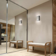 Load image into Gallery viewer, Layne LED Wall Light in living room.

