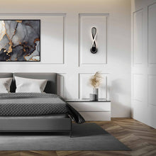 Load image into Gallery viewer, Marise LED Wall Light in bedroom.
