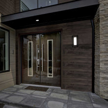 Load image into Gallery viewer, Tate Outdoor LED Wall Light in outside area.
