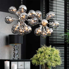 Load image into Gallery viewer, Ludlow Chandelier in dining room.
