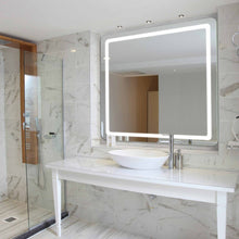 Load image into Gallery viewer, Aria LED Lighted Mirror in bathroom.
