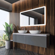 Load image into Gallery viewer, Eyla LED Lighted Mirror in bathroom.
