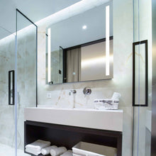 Load image into Gallery viewer, Fusion LED Lighted Mirror in bathroom.
