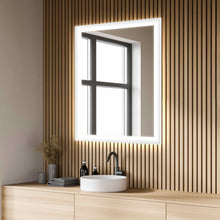 Load image into Gallery viewer, Silhouette LED Lighted Mirror in bathroom.

