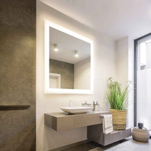 Load image into Gallery viewer, Silhouette LED Lighted Mirror in bathroom.
