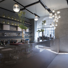 Load image into Gallery viewer, Empatia LED Suspension Light in living room.
