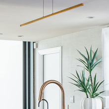 Load image into Gallery viewer, Essence LED Linear Suspension Light in kitchen.
