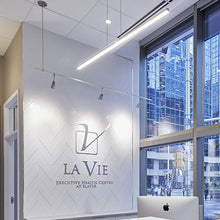 Load image into Gallery viewer, Essence LED Linear Suspension Light in office.
