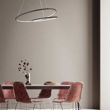 Load image into Gallery viewer, Cycle LED Pendant Light in living room.
