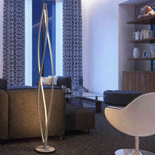 Load image into Gallery viewer, Cyclone LED Floor Lamp in living room.
