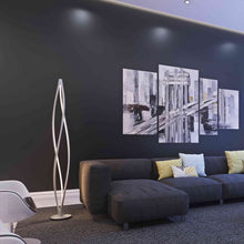 Load image into Gallery viewer, Cyclone LED Floor Lamp in living room.
