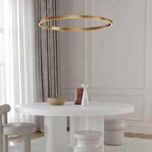 Load image into Gallery viewer, Groove LED Pendant Light in living room.
