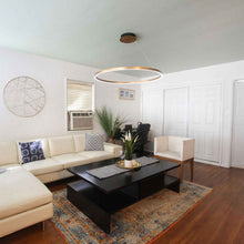 Load image into Gallery viewer, Groove LED Pendant Light in living room.
