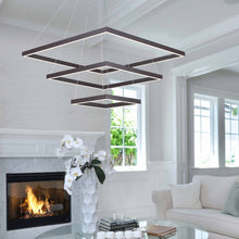 Load image into Gallery viewer, Quad Pendant Light in living room.
