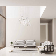 Load image into Gallery viewer, Rinkle LED Linear Pendant Light in living room.

