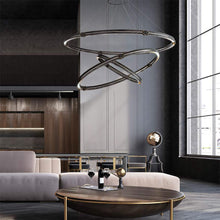 Load image into Gallery viewer, Admiral LED Multi Tier Chandelier in living room.
