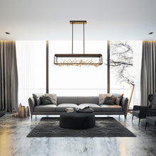Load image into Gallery viewer, Aerie LED Linear Pendant Light in living room.
