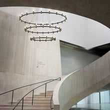 Load image into Gallery viewer, Albany LED Multi Tiered Chandelier in hallway.
