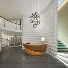 Load image into Gallery viewer, Arlington LED Multi Light Pendant Light in living room.
