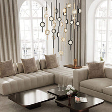 Load image into Gallery viewer, Barletta LED Multi Light Pendant Light in living room.
