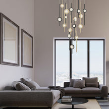 Load image into Gallery viewer, Barletta LED Multi Light Pendant Light in living room.
