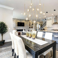 Load image into Gallery viewer, Barletta Oval LED Multi Light Pendant Light in dining room.
