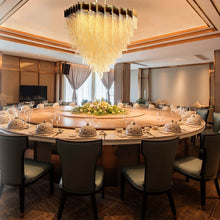 Load image into Gallery viewer, Bloomfield Oval LED Chandelier in restaurant.
