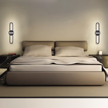 Load image into Gallery viewer, Botton LED Vanity Wall Light in bedroom.
