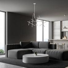 Load image into Gallery viewer, Crossroads LED Chandelier in living room.
