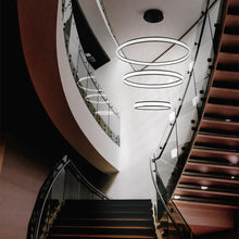 Load image into Gallery viewer, Forster LED Multi Tier Chandelier in stair.
