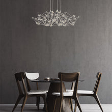 Load image into Gallery viewer, Leonardelli LED Chandelier in living room.
