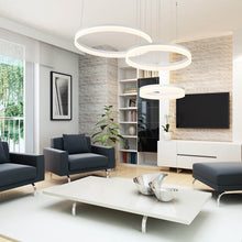 Load image into Gallery viewer, Minuta LED Multi Tier Chandelier in living room.
