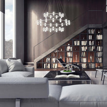Load image into Gallery viewer, Netto LED Multi Tier Chandelier in living room.
