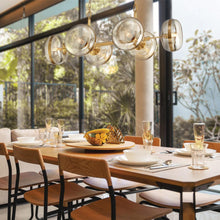 Load image into Gallery viewer, Nottingham Oval Chandelier in dining room.
