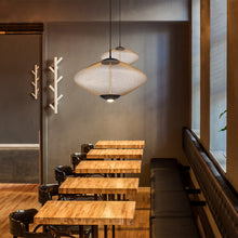 Load image into Gallery viewer, Park LED Pendant Light in restaurant.
