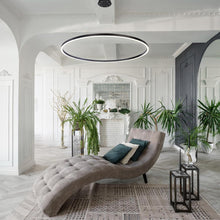 Load image into Gallery viewer, Spunto LED Chandelier in living room.
