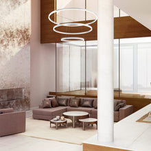 Load image into Gallery viewer, Spunto LED Multi Tier Chandelier in living room.
