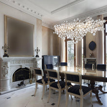 Load image into Gallery viewer, Trento Linear Chandelier in dining room.

