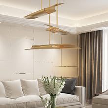 Load image into Gallery viewer, Umura LED Chandelier in living room.
