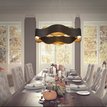 Load image into Gallery viewer, Vaughan LED Chandelier in dining room.
