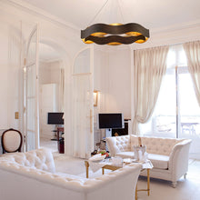 Load image into Gallery viewer, Vaughan LED Chandelier in living room.
